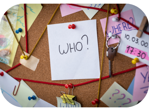 pins with string and paper on a cork board for solving a crime